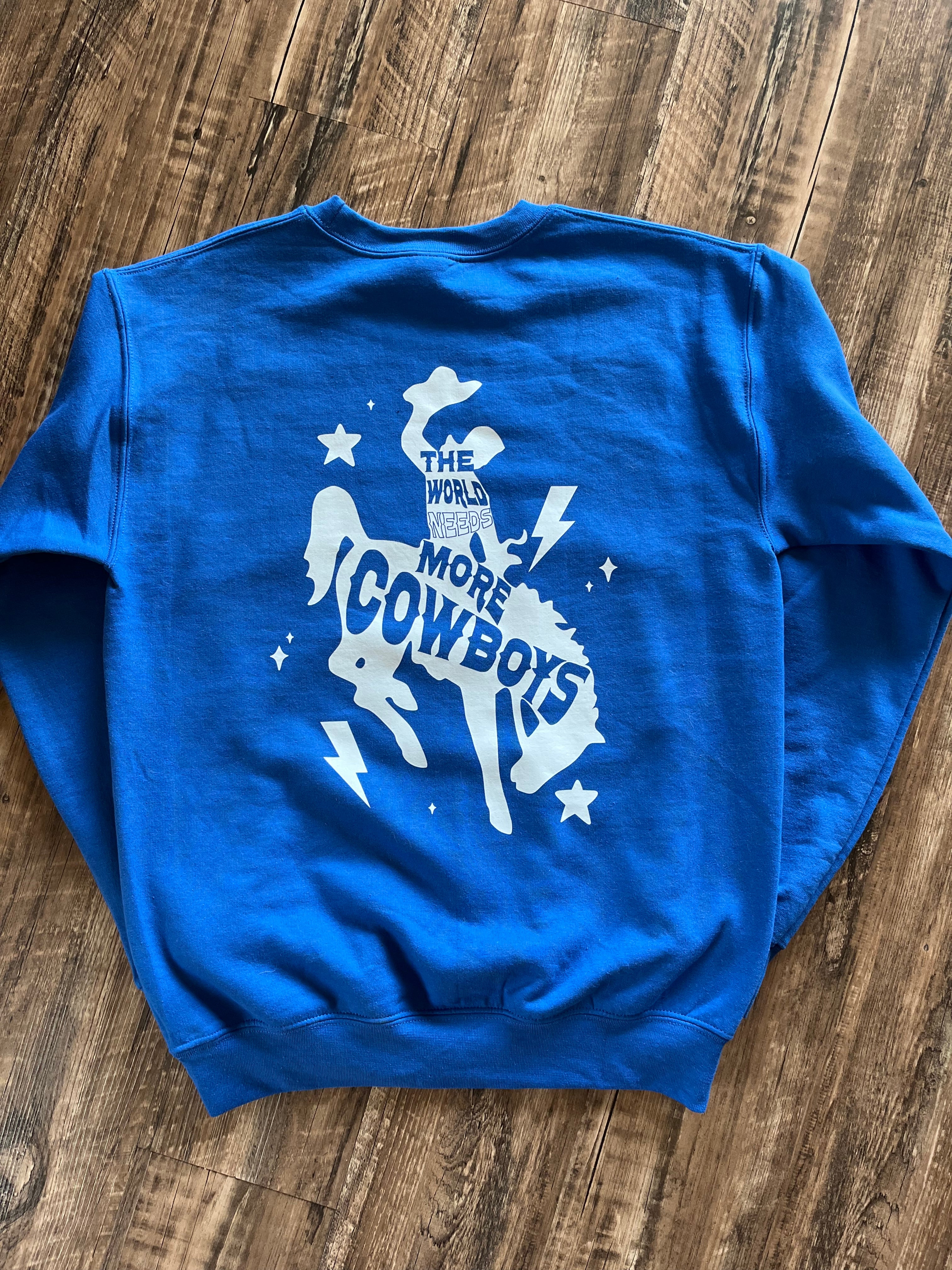 The World Needs More Cowboys Crewneck